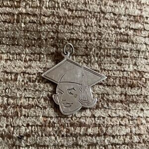 60’s vintage graduation young women head and cap marked ‘Sterling CT’